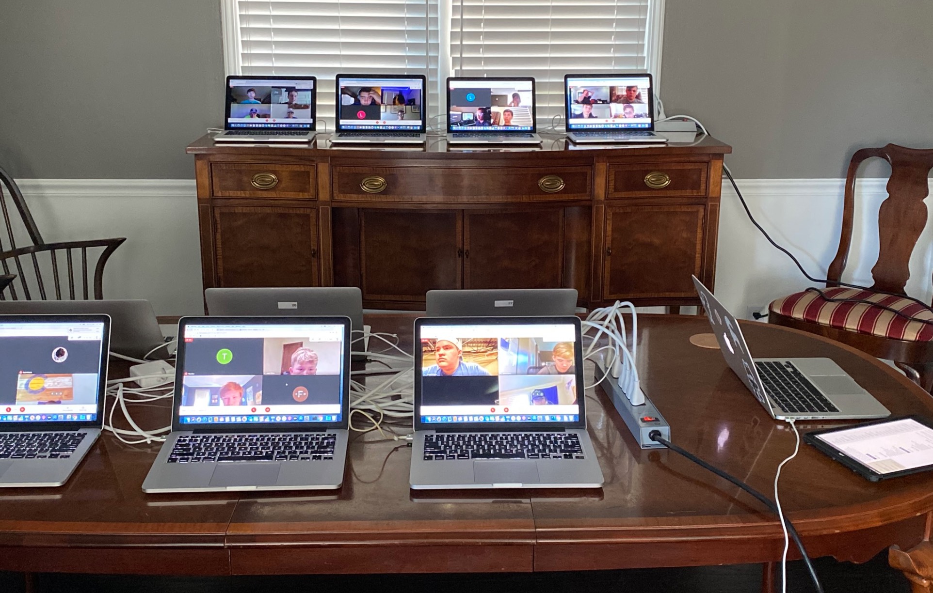 Online Intro CS class taught through Google Meets on 10 laptops in my dining room.